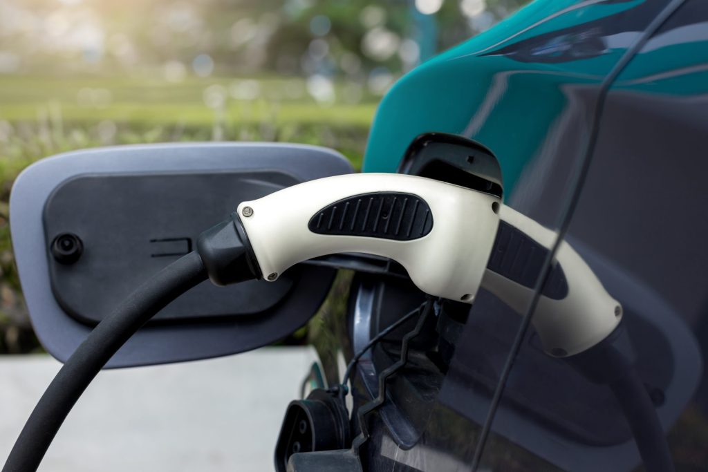 Commercial EV charger installation North West electric car charging in parking bay