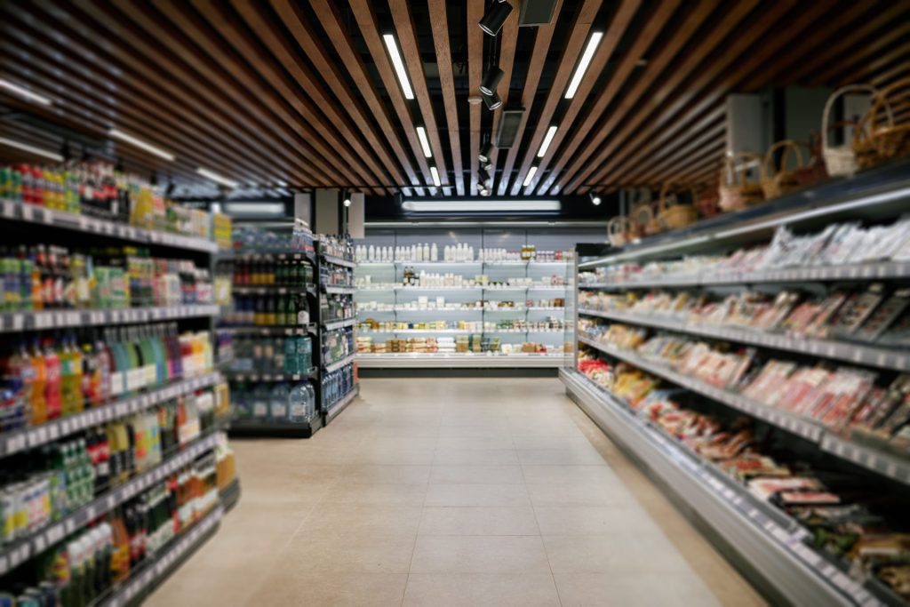 Retail supermarket interior representing multi-site retail operations and commercial facilities